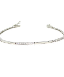 Pulsera de oro blanco de 18k para mujer de eslabones rígidos con 45 circonitas. Tamaño, 18.00 cm larga.