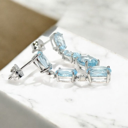 Preciosos pendientes con 6 topacios azules sky y 4 diamantes de 0.10cts montados en oro blanco de 18k - Imagen 7