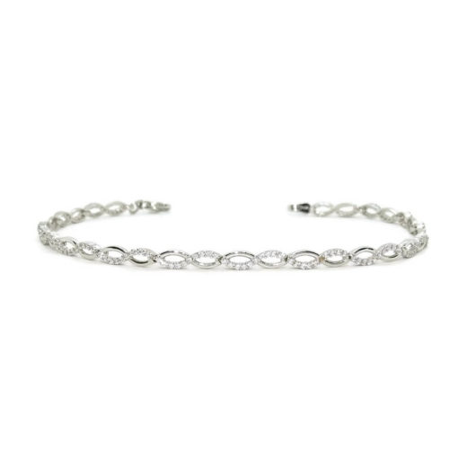 Pulsera semi-rígida de oro blanco de 18k con 15 infinitos y circonitas. - Imagen 4