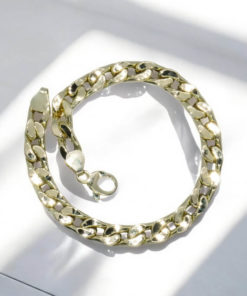 Impresionante pulsera para hombre de oro amarillo de 18k de 22.00 cm de larga y 7.00 mm de ancha, modelo barbada plana. 10.30 gr de oro de 18k