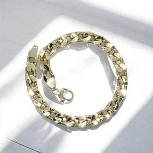 Impresionante pulsera para hombre de oro amarillo de 18k de 22.00 cm de larga y 7.00 mm de ancha, modelo barbada plana. 10.30 gr de oro de 18k