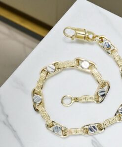 Pulsera para hombre de oro amarillo y oro blanco de 18k con greca y detalle de tornillo - Imagen 9