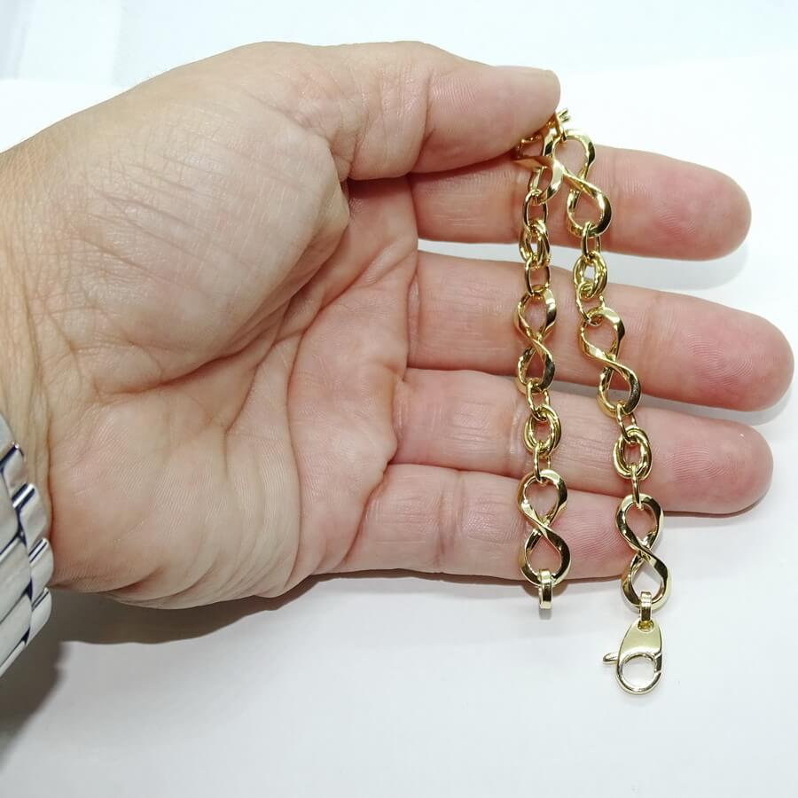 Pulsera para mujer en oro amarillo 18k con 6 infinitos y eslabones. 19cm de larga, 8mm de ancha, 4.30g de oro 1ª Ley. Diseño elegante y moderno con certificado Never Say Never. - Imagen 3