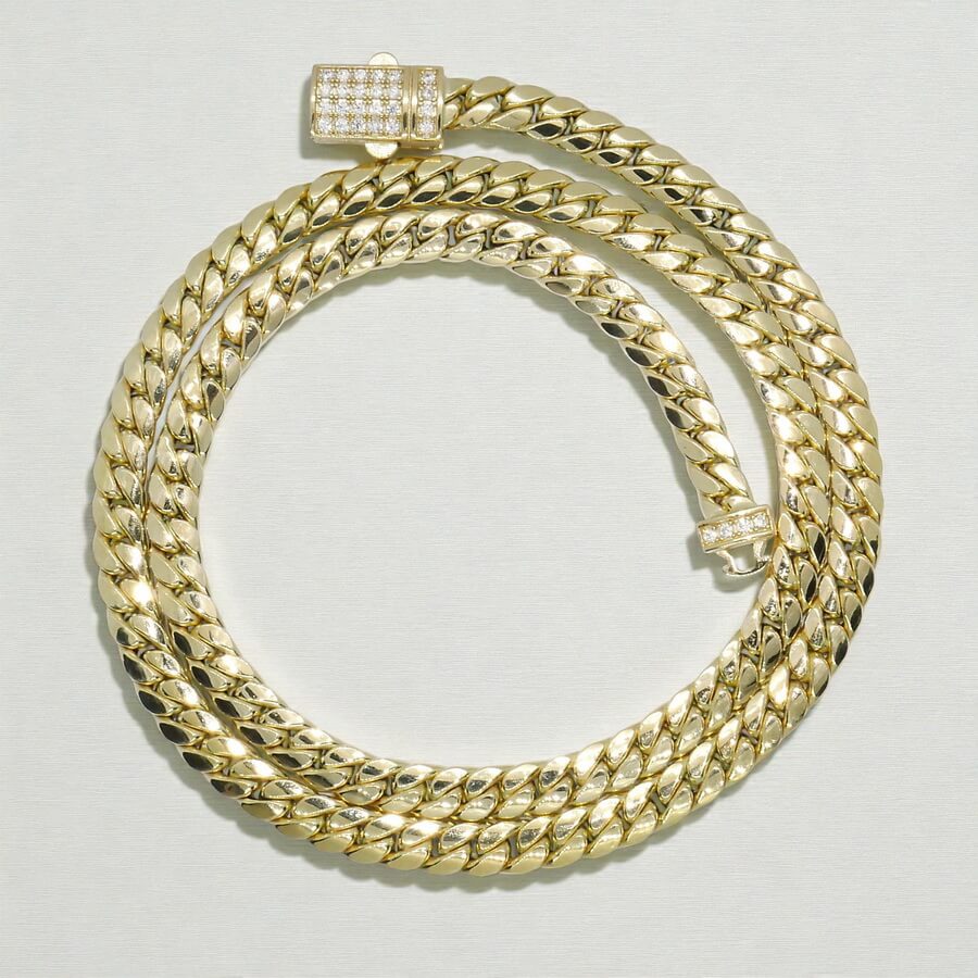 Cadena Cubana para Hombre y mujer de Oro Amarillo 18k – 7mm – 60cm – 26.15g – Cierre Mónaco con Circonitas