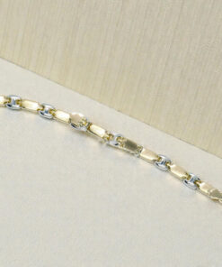 Pulsera bicolor de oro de 18k para mujer, calabrote en oro blanco y cierre mosquetón - Imagen 7