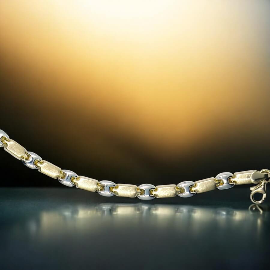 Pulsera bicolor de oro de 18k para mujer, calabrote en oro blanco y cierre mosquetón - Imagen 9