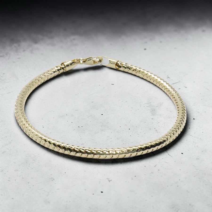 Pulsera semirrígida elástica de oro de 18k – 2,80 g | Medida interior 62 mm | Cierre mosquetón - Imagen 4
