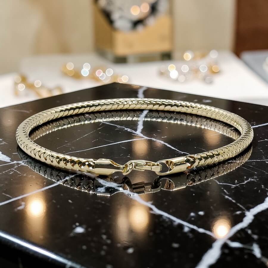 Pulsera semirrígida elástica de oro de 18k – 2,80 g | Medida interior 62 mm | Cierre mosquetón - Imagen 10