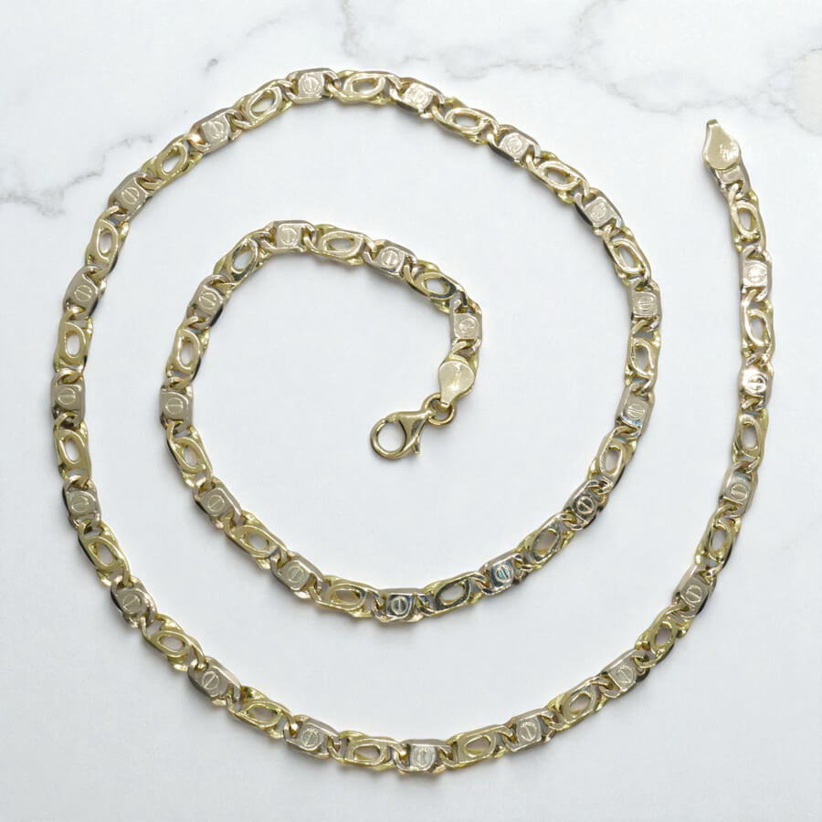 Cadena de oro bicolor de 18k maciza para hombre de 5.50 mm de ancha y 60cm de larga. - Imagen 4